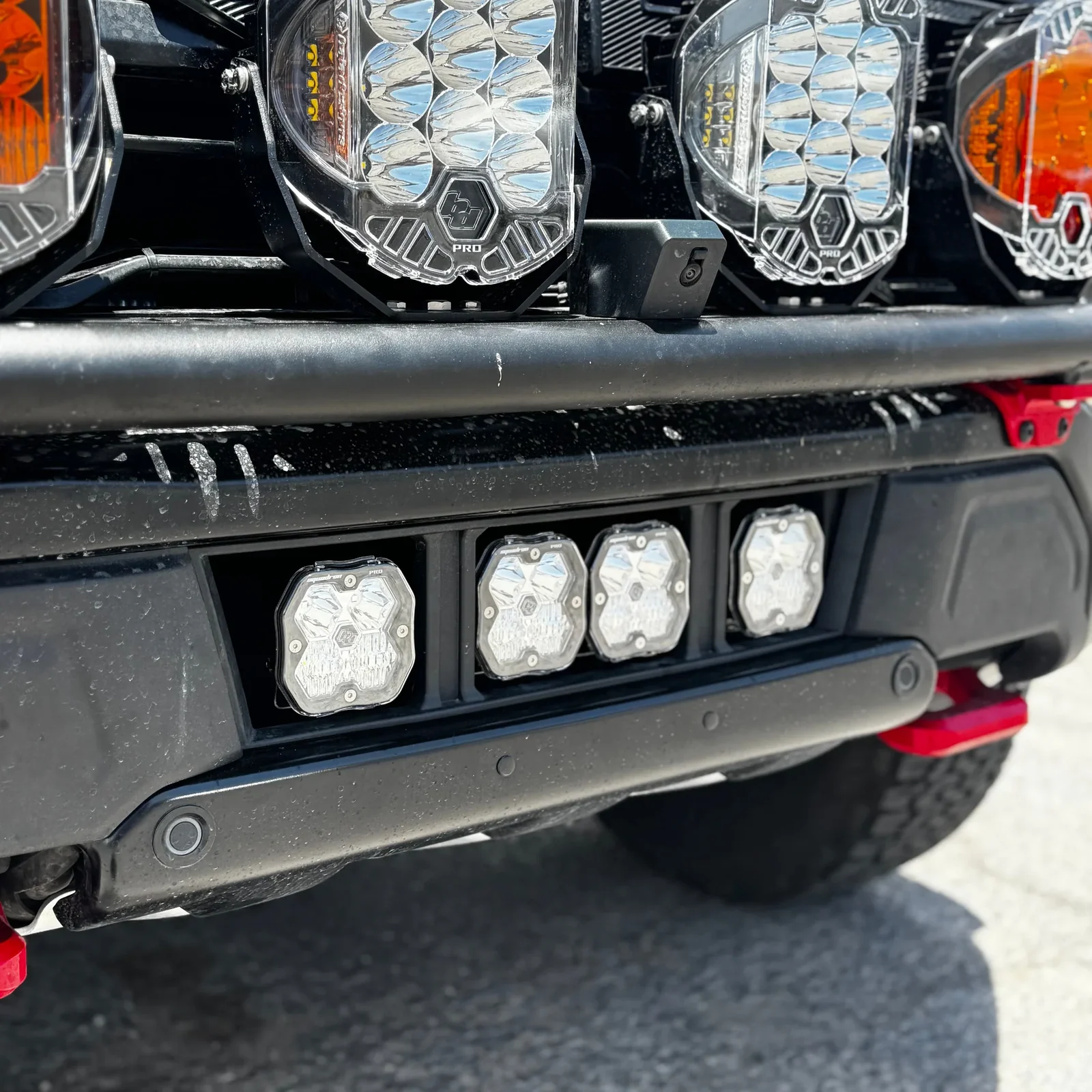 Baja Designs auxiliary LED lights mounted on a vehicle bumper
